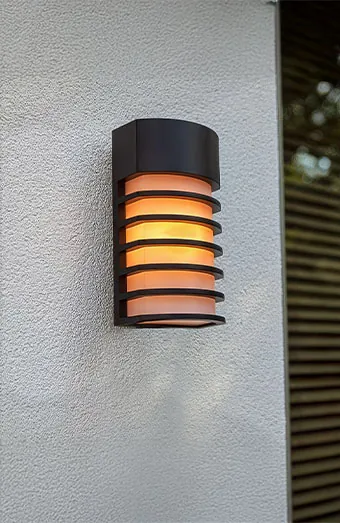 Exterior lighting installation on a Gold Coast property at dusk